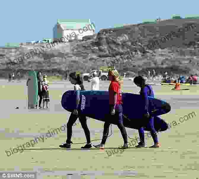 Group Of Surfers Enjoying The Beach In Britain Surf UK: The Definitive Guide To Surfing In Britain